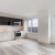 a kitchen with a wood floor