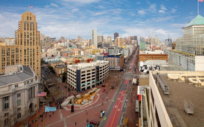 a city with a road and buildings